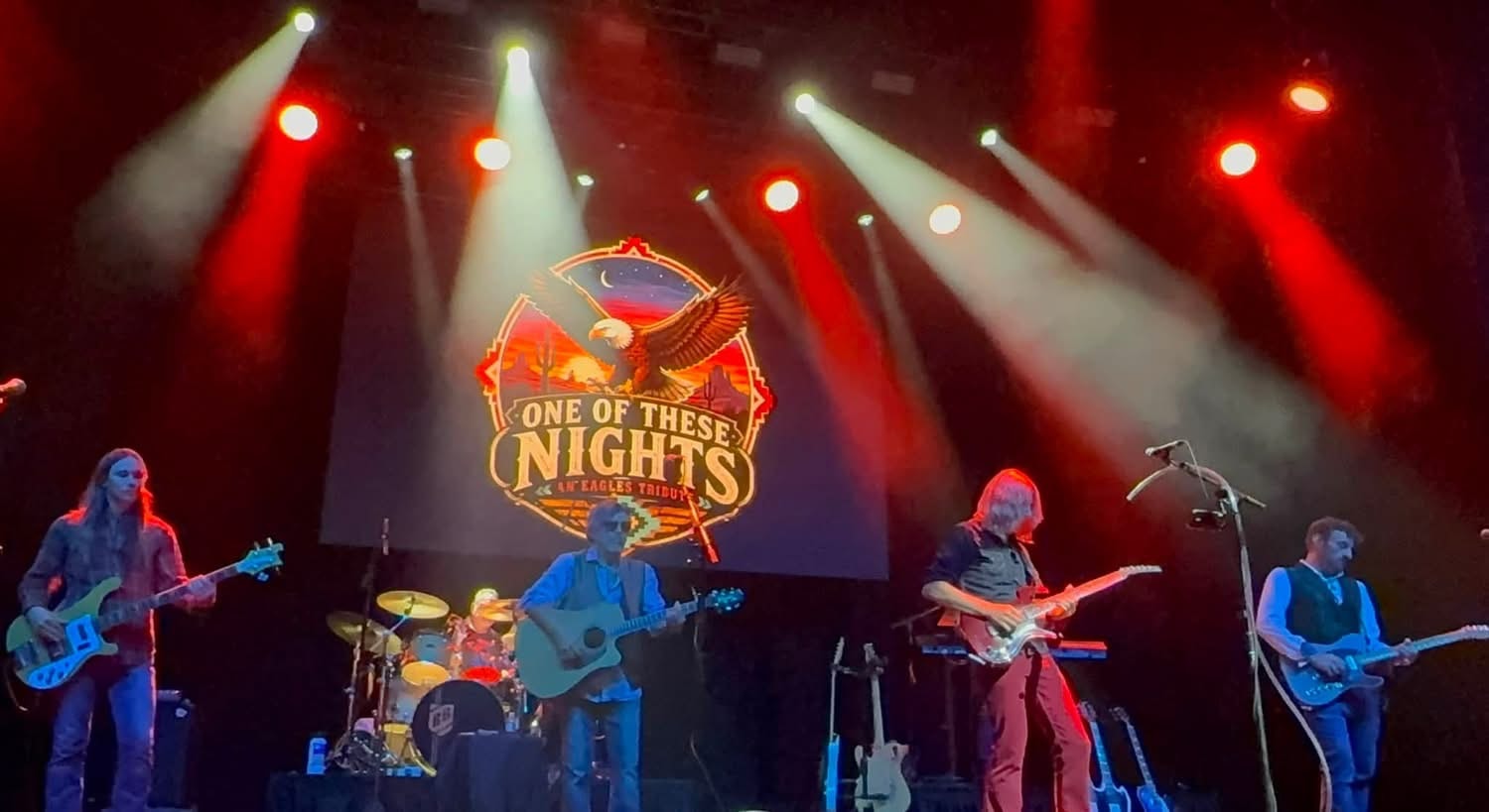 Eagles tribute band performing on stage