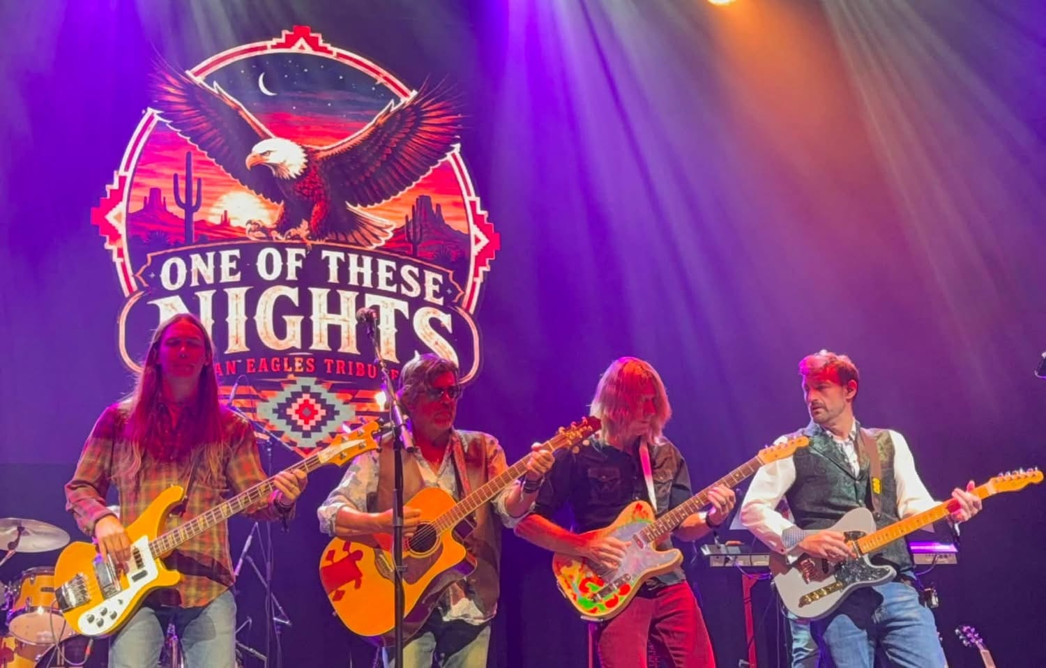 Eagles tribute band performing on stage